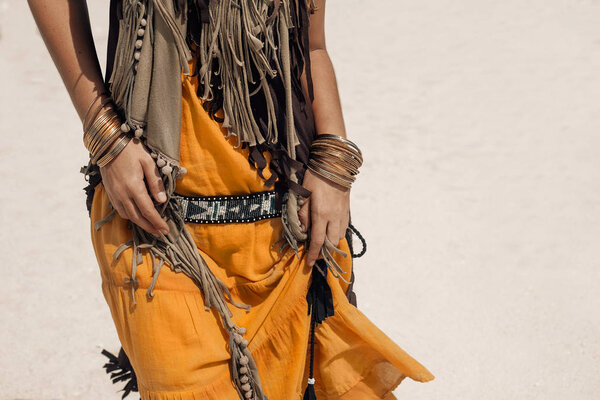 cropped image of bohemian style woman details