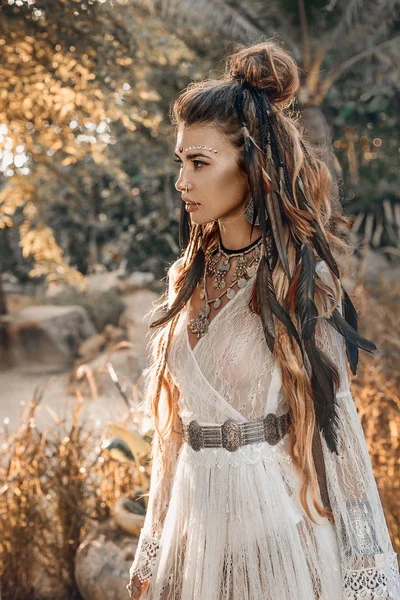 Beautiful young fashionable woman in turban outdoors at sunset — Stock Photo, Image