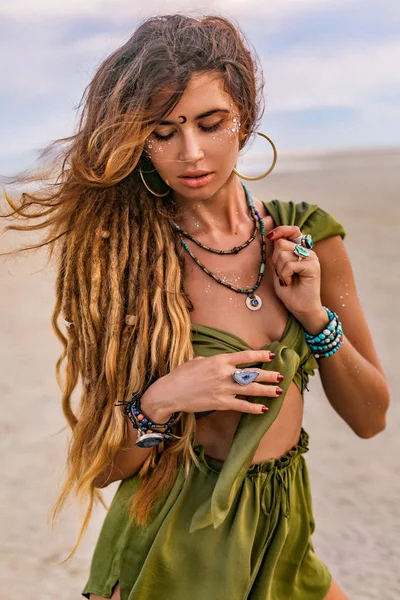 Young stylish hippie woman on the beach at sunset portrait — Stock Photo, Image