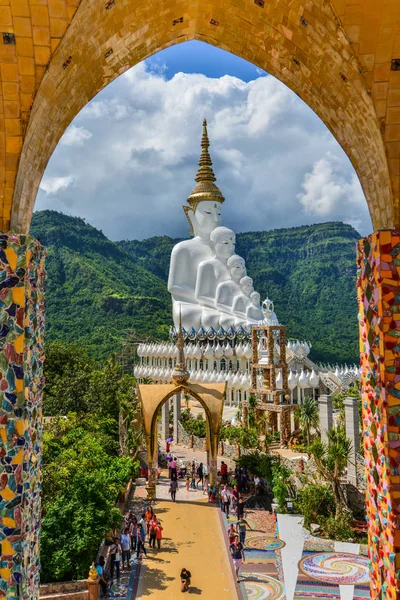 Buddhist tourists sightseeing beautiful white five Buddha Images — Stock Photo, Image