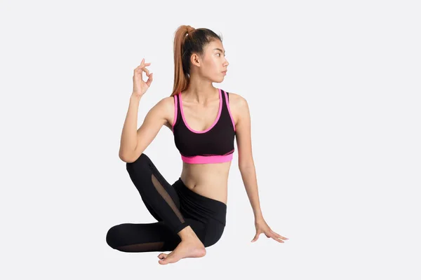 Young woman in yoga pose. — Stock Photo, Image