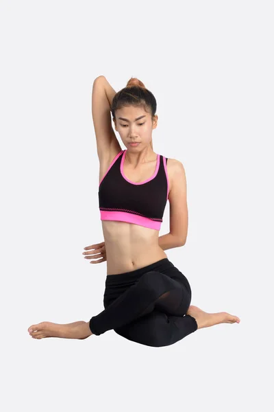 Young woman in yoga pose. — Stock Photo, Image