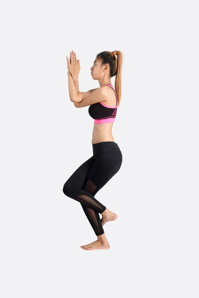 Jonge vrouw in yoga pose. — Stockfoto