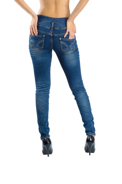 Женские синие джинсы вид сзади — стоковое фото