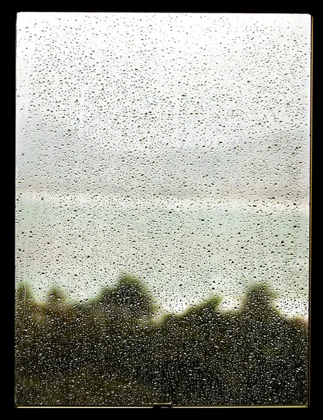 Janela com gotas de chuva — Fotografia de Stock