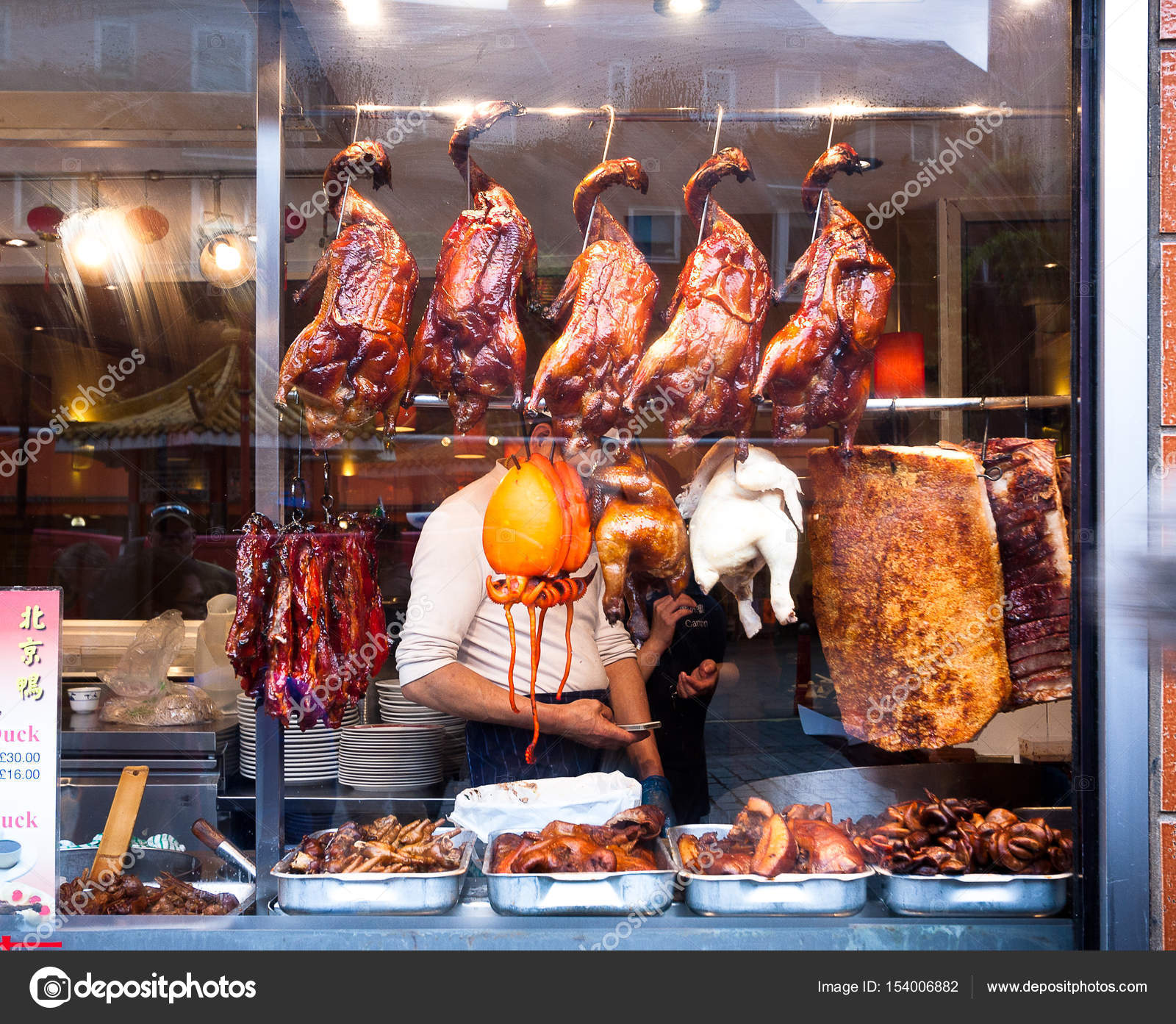 Chinese food in Chinatown, London, UK. – Stock Editorial Photo