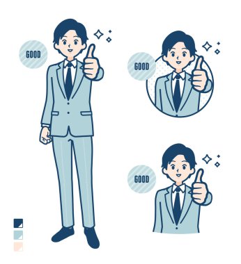 Takım elbiseli genç bir işadamı resimlerini yukarı kaldırdı.