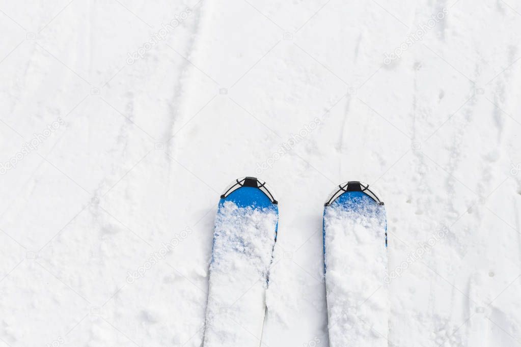 Ski equipment. Top view. white background. Snow. Winter season