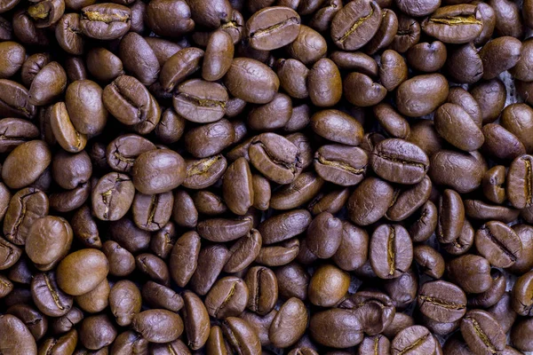 grains of black fragrant coffee