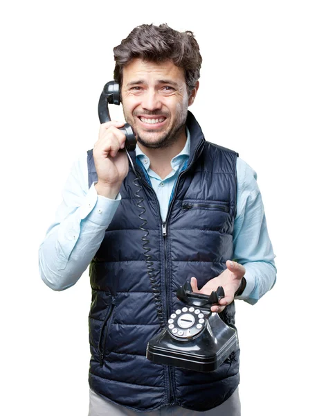 Homem com colete a falar ao telefone — Fotografia de Stock