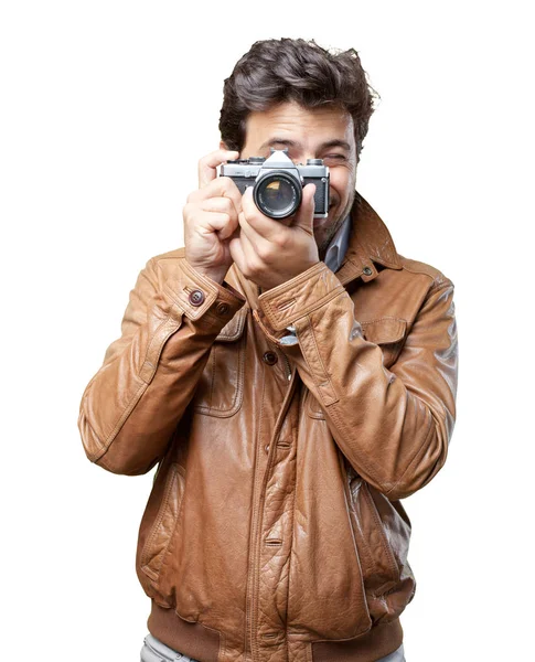 Turista com jaqueta marrom em branco — Fotografia de Stock