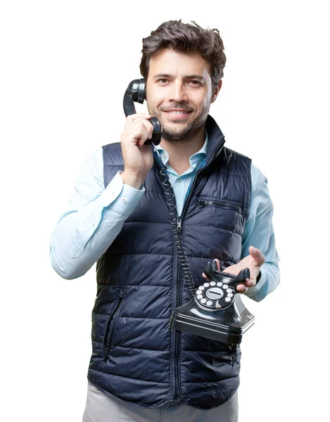 Hombre con chaleco hablando por teléfono —  Fotos de Stock