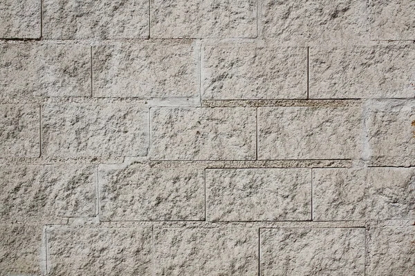 Yontma taş duvar arka plan veya doku