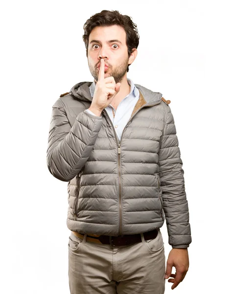 Homem preocupado fazendo um gesto de silêncio — Fotografia de Stock
