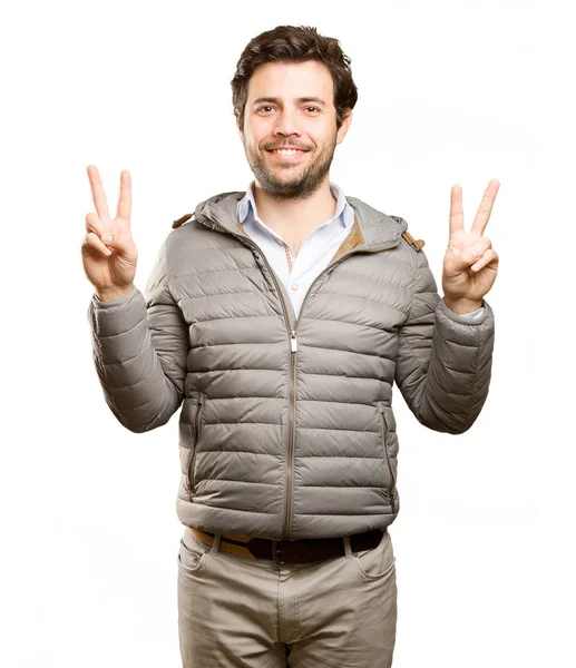 Hombre feliz haciendo un gesto de victoria — Foto de Stock