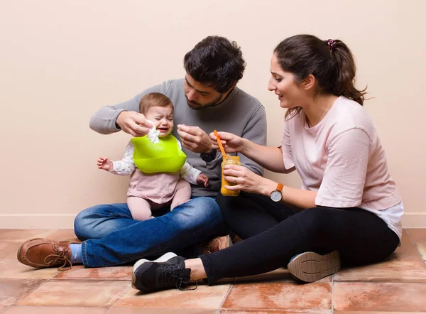 Baby Parents Having Lunch Stock Image