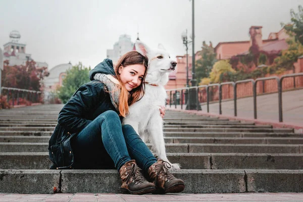 Beautiful Girl with white dog — Stock Photo, Image