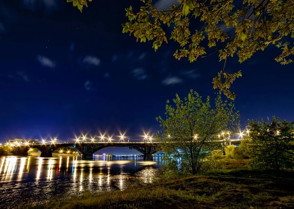 Bridge over Angara river at night in Irkutsk city