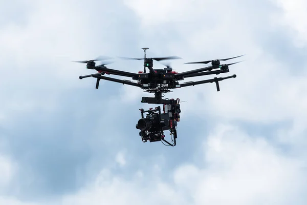 Drone with professional cinema camera flying