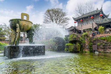 The fountain landscape in the ancient town of Huanglong Valley,  clipart