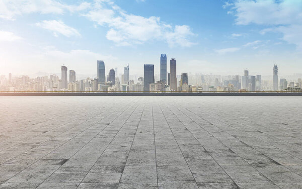 Urban skyline and road pavement