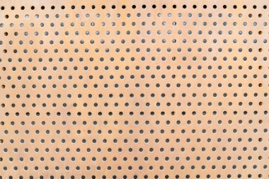 Yuvarlak delikli bir tahta.