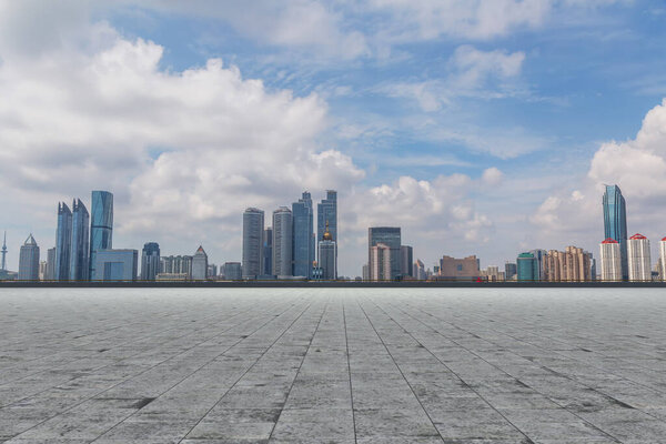 Square ground and city skyline