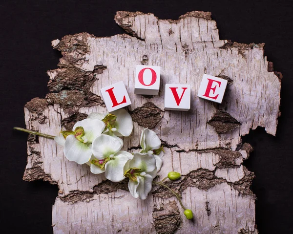 3D kostky s písmeny tvořící slovo láska — Stock fotografie