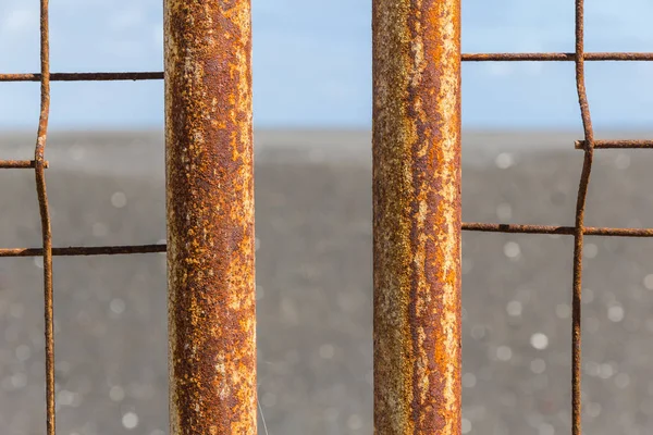 Rusting of iron fence with corrosion. — Stock Photo, Image
