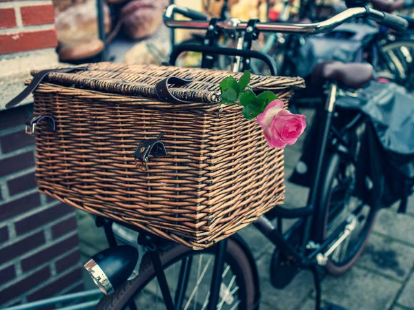 14 February, Valentine's day. Urban black bike with one fresh ro