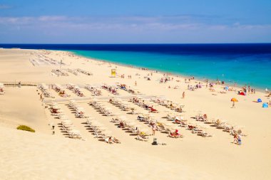 The beach Playa de Morro Jable. Morro Jable - Fuerteventura - Spain - 25.06.2016. clipart