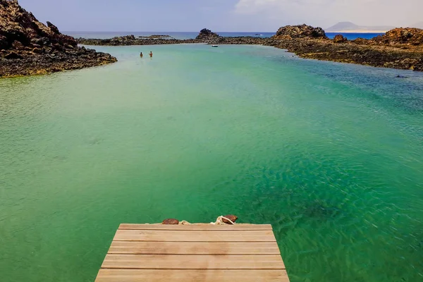 Lagün bilinmeyen Yüzme kişi ve bir teknede Adası Lobos
