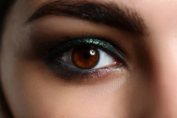 Female left green coloured eye extreme closeup — Stock Photo, Image