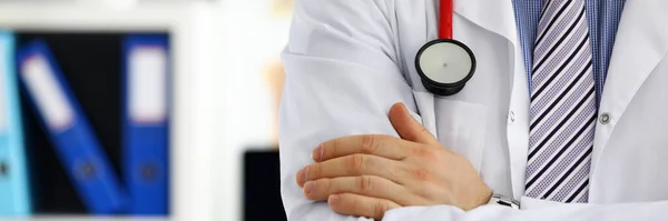 Male medicine doctor hands crossed on his chest — Stock Photo, Image