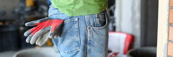 Roupa de trabalho no construtor, luvas de borracha seu bolso — Fotografia de Stock