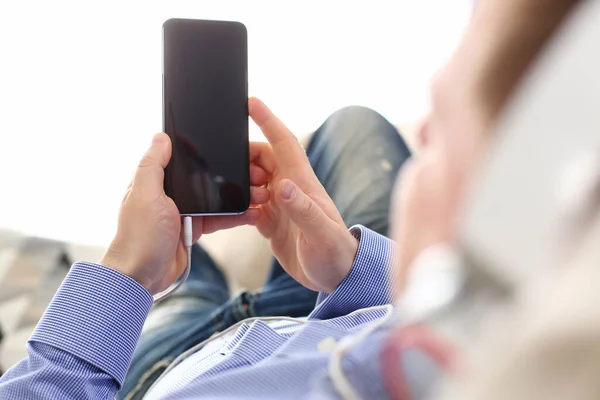 Guy take cellphone for communication — Stockfoto