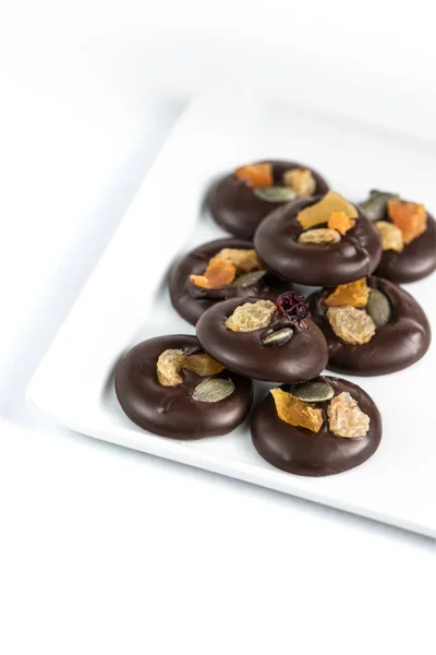 Gourmet chocolate treats with dryed fruits and nuts.