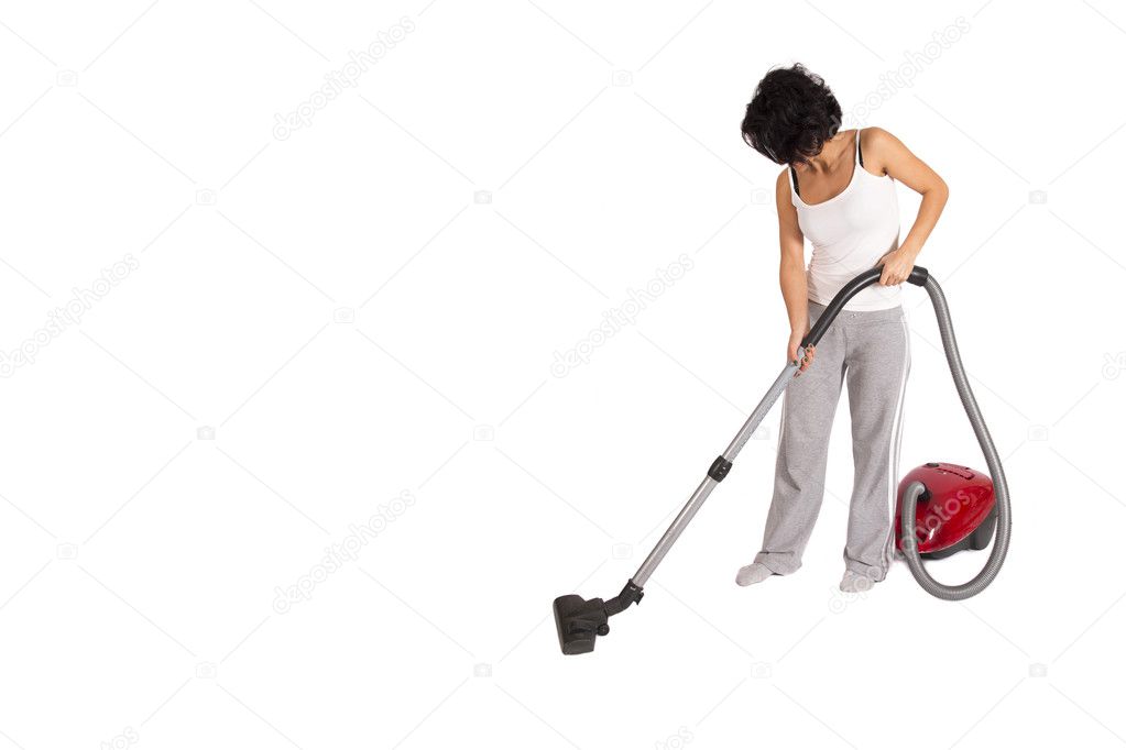 young woman cleaning house vith vacuum cleaner