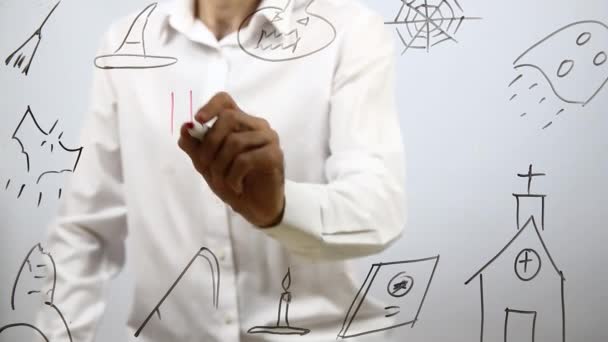 Hombre escribiendo feliz halloween en pantalla transparente — Vídeo de stock