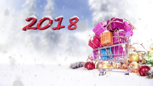 Gift filled shopping cart and happy new year message under snowfall — Stock Video