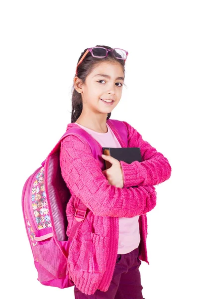 Estudante da escola primária menina sorrindo e olhando — Fotografia de Stock