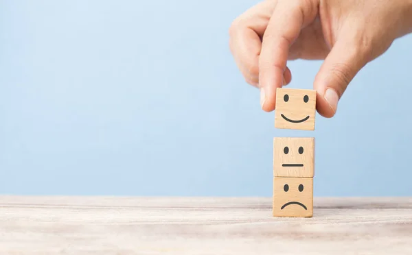 Customer satisfaction concept. smiling face on sad face — Stock Photo, Image