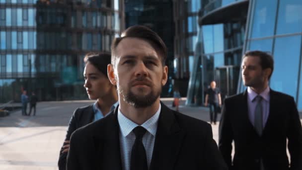 Epic shot of three serious business people — Stock Video