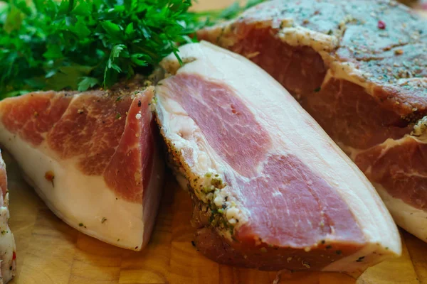 Pork pieces are salted in the traditional way. — Stock Image Pork pieces are salted in the traditional way. Stock Image