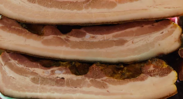 Large pieces of salted fat, cooked in a traditional way. — Stock Image Large pieces of salted fat, cooked in a traditional way. Stock Image