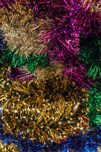 colorful Christmas tinsel to decorate the premises and Christmas trees.