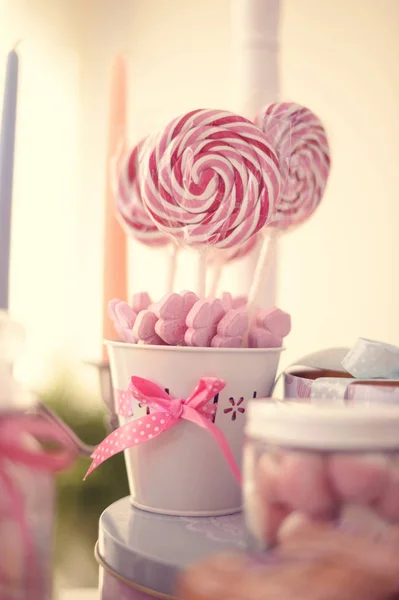 White and red lolly pops in a vase — Stock Photo, Image