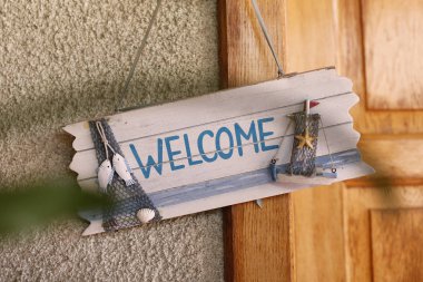 Bir duvar tabelada hoş geldiniz metni