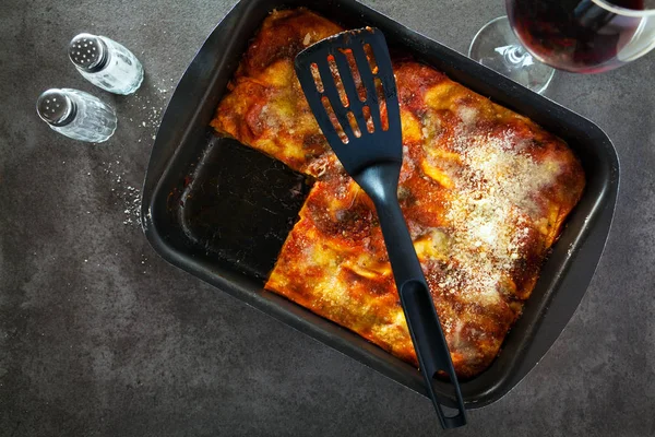 classic Italian eggplant Lasagna with vegetables and red wine in