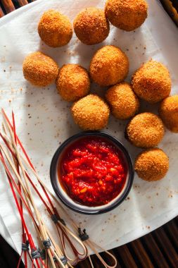 Fried Arancini rice balls . Typical Sicilian street food with sp clipart